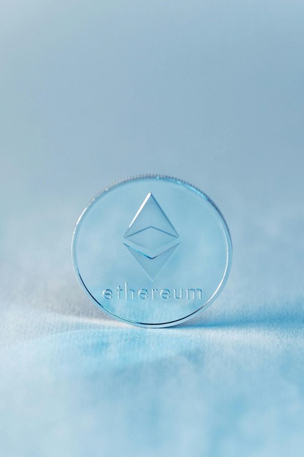 Ethereum coin on a light blue background