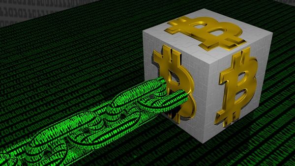 Cube with Bitcoin symbols connected to a green digital data cable